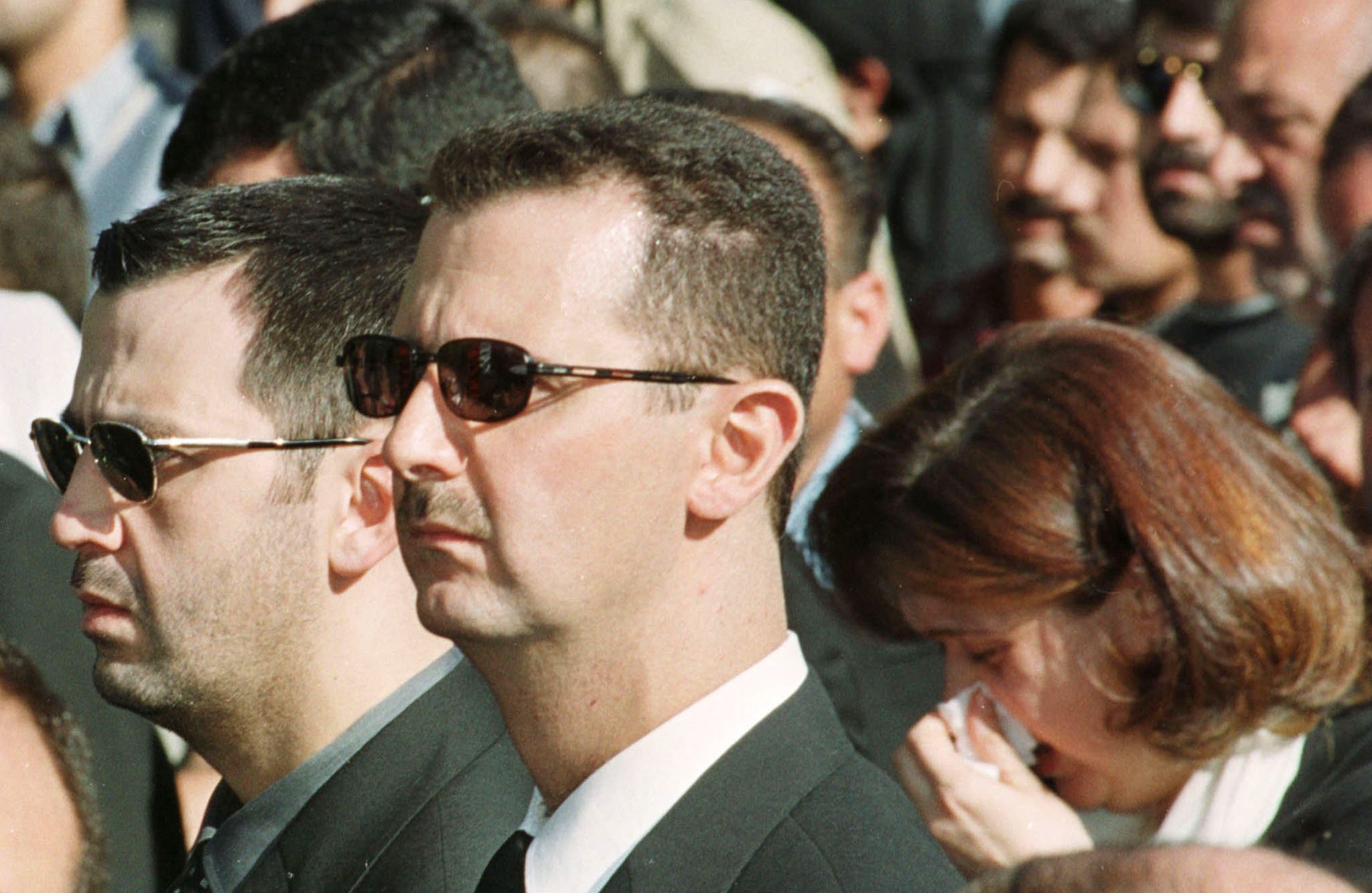 Reuters/ بشار الأسد على اليمين وماهر الأسد على اليسار