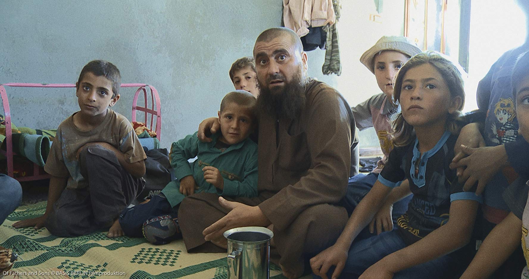 من فيلم "عن الآباء والأبناء Of Fathers and Sons" للمخرج السوري طلال ديركي (IMDB)