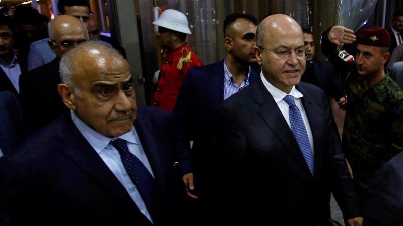 رئيس وزراء العراق بين نارَي الصدر وسليماني.. يريد الاستقالة لكن رسالة مشفرة من دولة مجاورة تمنعه