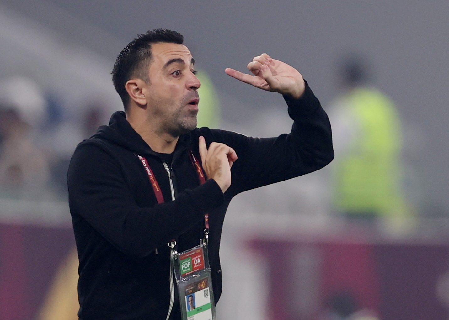تشافي مرشح بقوة للرحيل عن السد وقيادة برشلونة (رويترز)