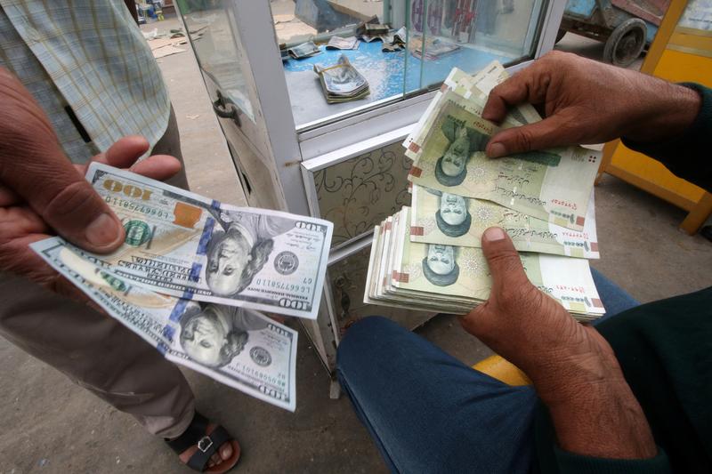 الدولار العراقي مقابل الدولار الأمريكي